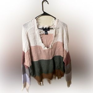 Distressed striped sweater